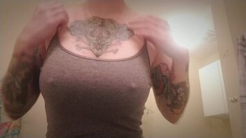 tattooed girl surprises with big untattooed tits
