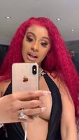 Cardi B flaunting her tongue and her sister’s figure