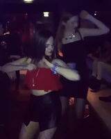 Two girls showing off at the club